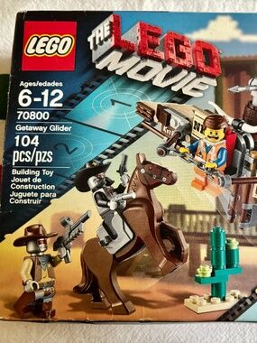 THE LEGO MOVIE "Getaway Glider" 70800 from 2014. UNOPENED. BOX IS distressed.